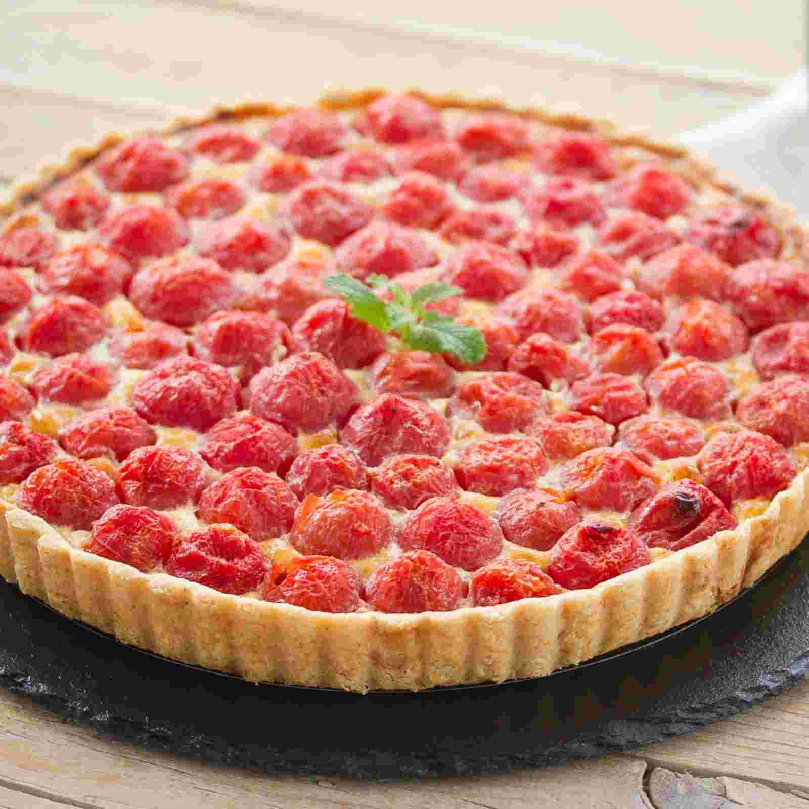 https://img2.rtve.es/imagenes/comer-cantar-quiche-tomates-cherry/01715335292131.jpg