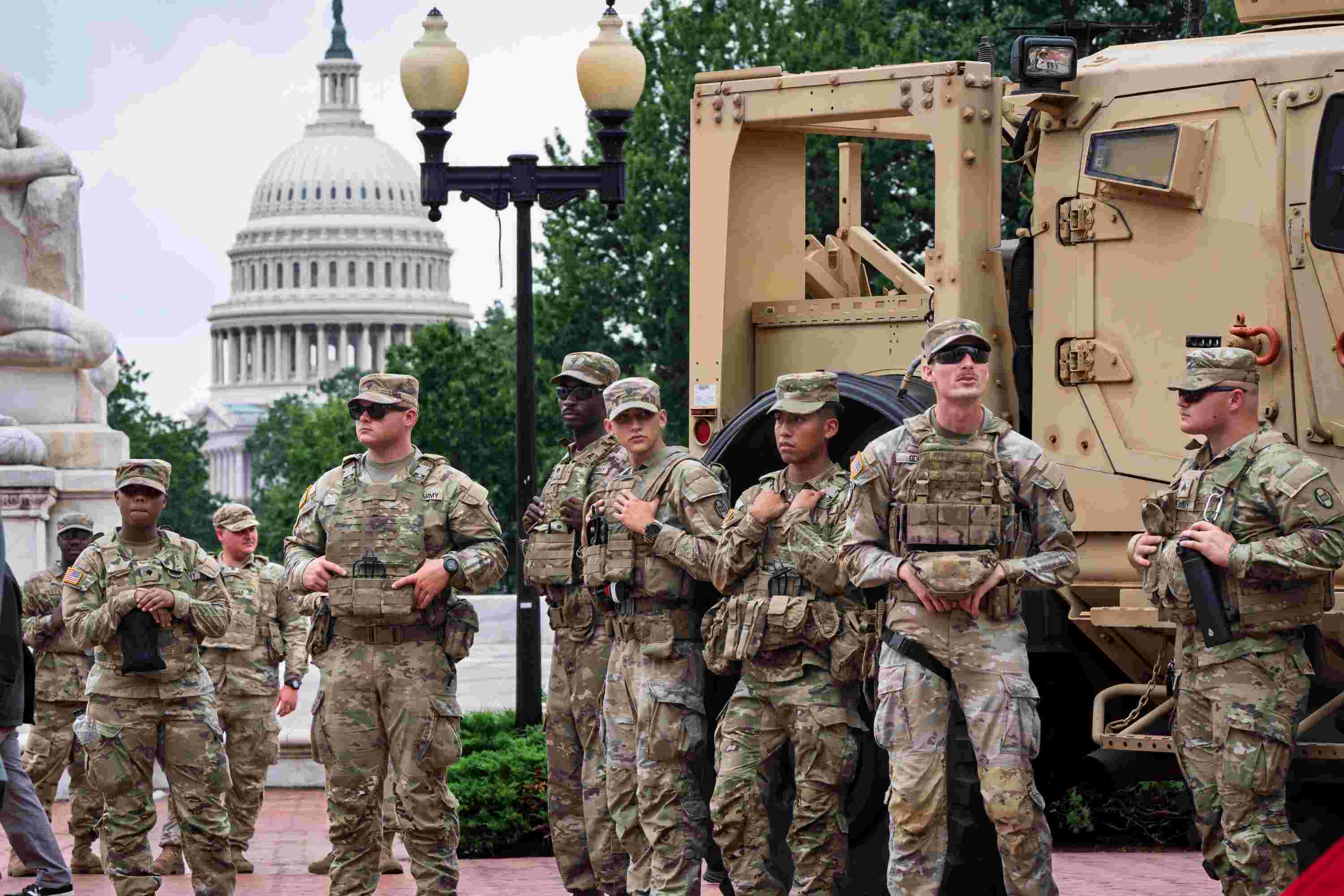 https://cdn.houstonpublicmedia.org/wp-content/uploads/2025/10/24101201/National-Guard-troops-in-Washington-DC.jpg
